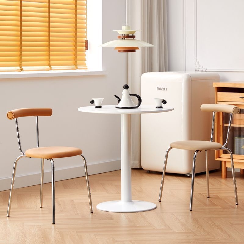 Silla de comedor doméstica simple silla de respaldo moderna retro nórdica silla de comedor de lujo pequeño tipo de alojamiento residencial se puede apilar mesa y silla de comedor