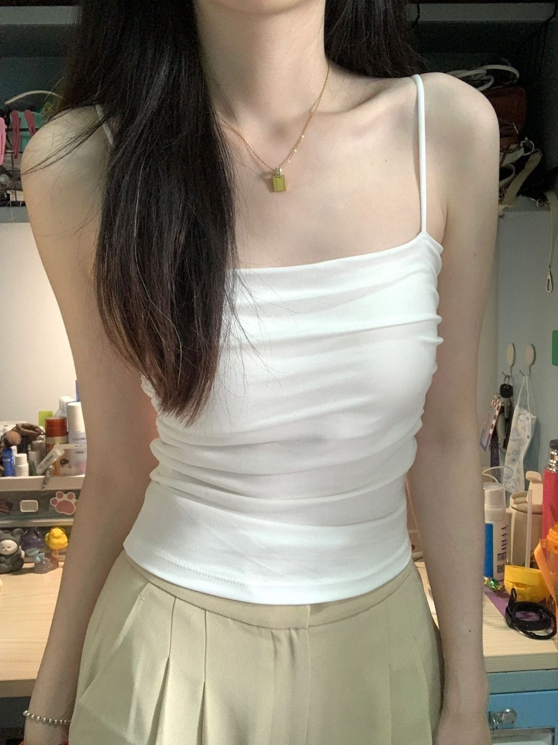 ギャルのストラップのベストの女性の中に胸のパッドをつけて底の美背の下着の女性のしわのデザイン感があります。