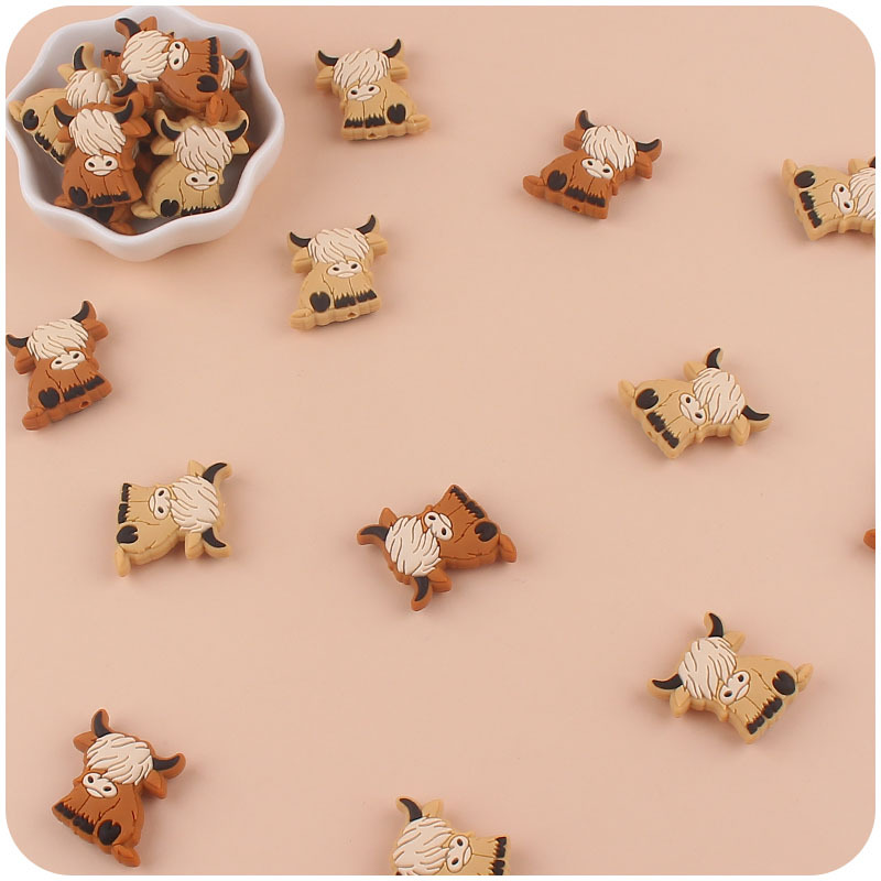 Bebé suministros de dibujos animados de silicona vaca mordedor creativo DIY bebé molar pezón cadena anti-gota cadena accesorios pequeños