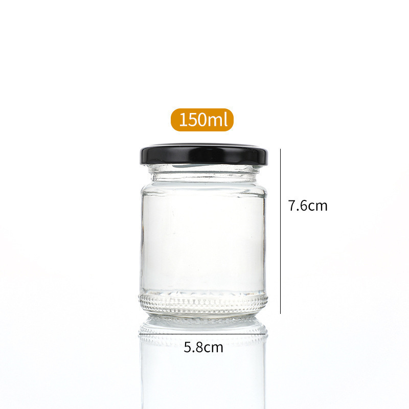 Botella de salsa redonda resistente a altas temperaturas sellada transparente resistente a altas temperaturas botella de melocotón amarillo enlatada botella de miel frutas botella de vidrio spot