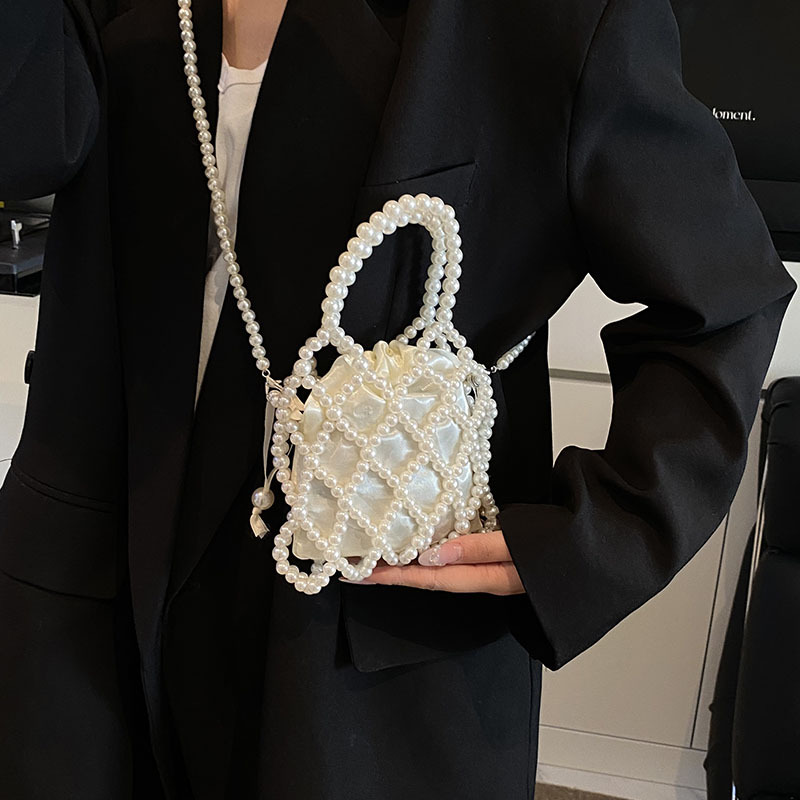 Bolso de moda coreano 2025 primavera y verano nuevo bolso femenino diseño de nicho bolso de hombro estilo occidental bolso de mensajero con cuentas marea