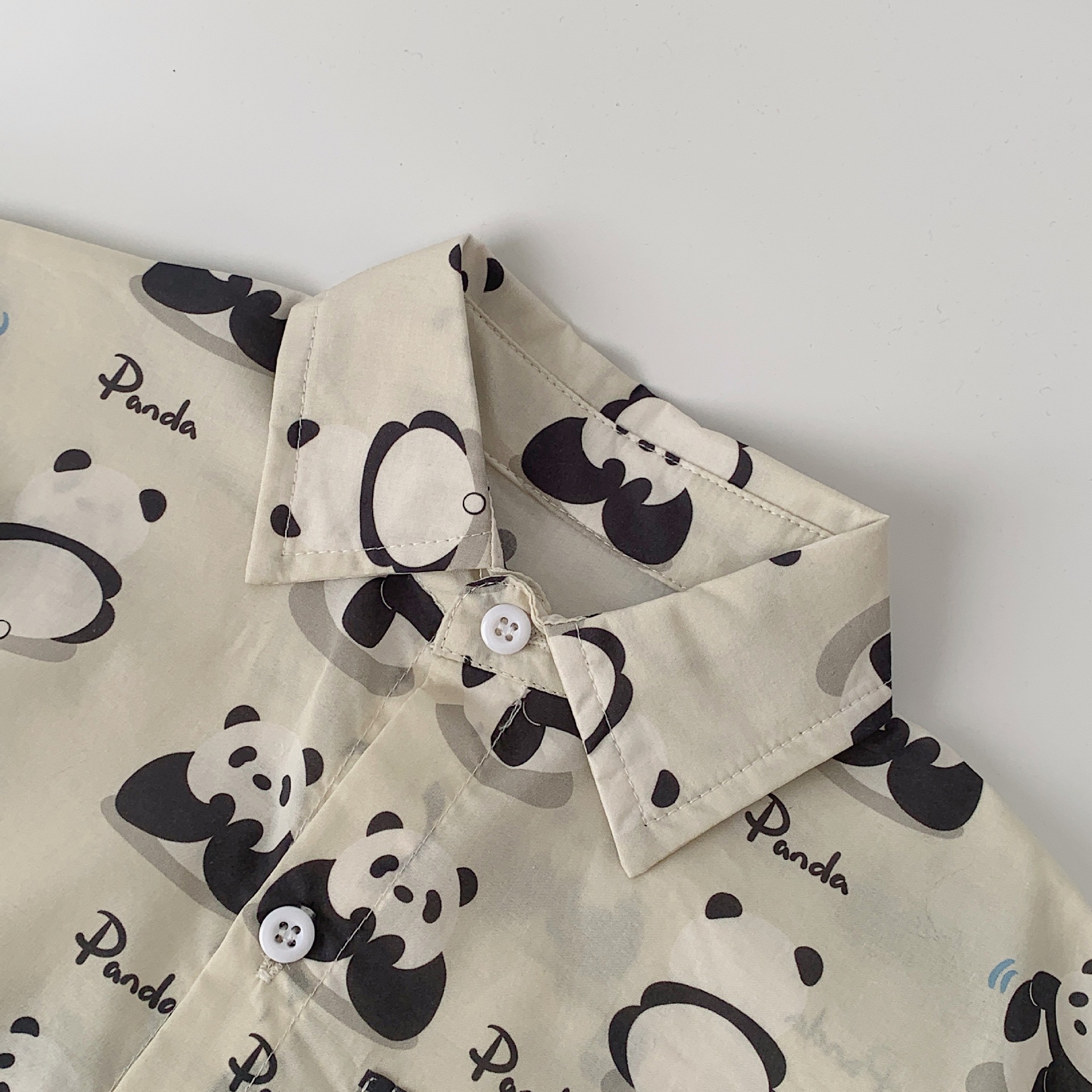 Camisa para niños Maibao Primavera 2025 Nuevos productos Cárdigan de oso Niños y niñas Camisa estampada de dibujos animados Chaqueta casual