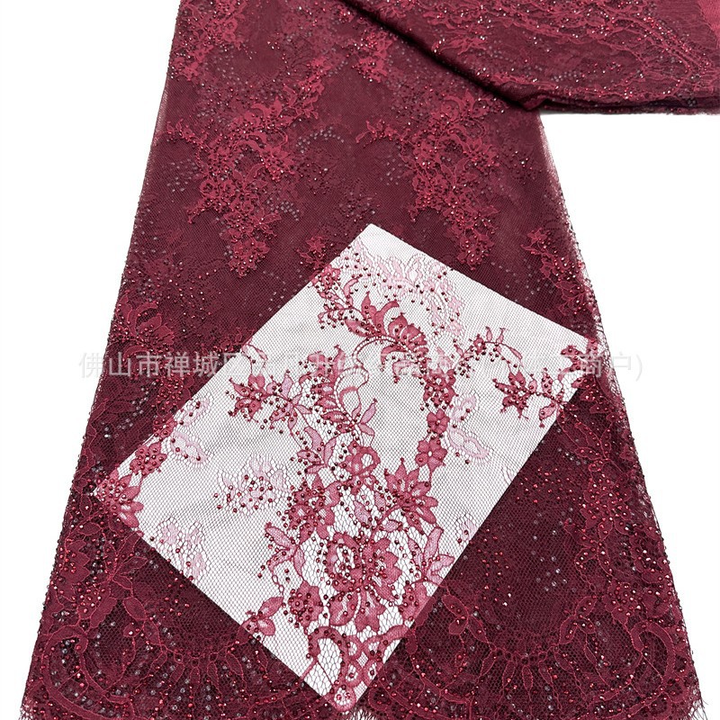 Tejido de malla de pestañas de encaje caliente flor retro hecha a mano verde diamante de cola de pez vestido de noche tela de boda en stock