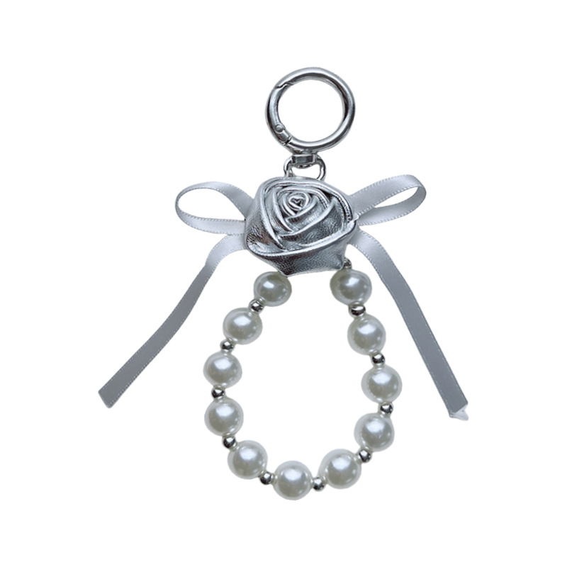 Cuero pu pequeño rosa llavero perla arco flores coreana llavero de automóvil bolso colgante bolso para mujeres