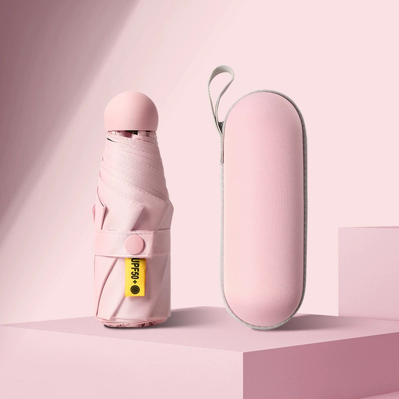 50% de descuento paraguas de cápsula de seis huesos paraguas de Sol de doble uso pequeño paraguas de bolsillo portátil simple pegamento negro paraguas de protección solar al por mayor