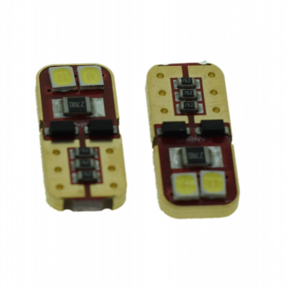 Заводские поставки: автомобильные светодиодные габаритные огни, теплый белый свет T10 3030 4SMD для подсветки номерного знака, эксклюзивно для трансграничных продаж, красная основа с золотыми краями.