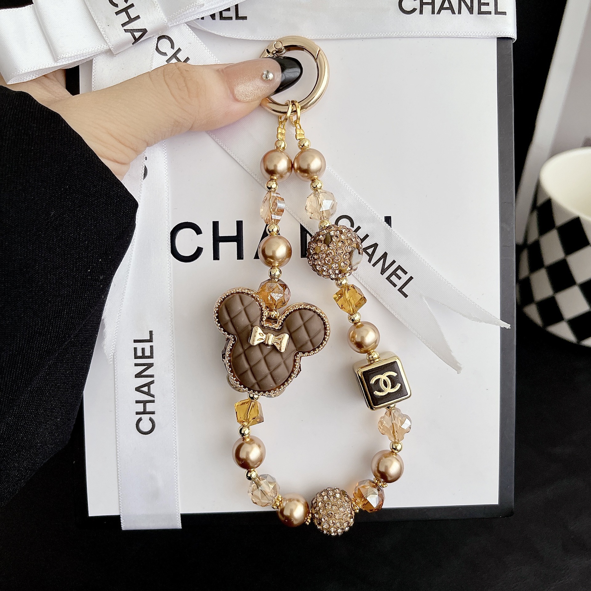 Hecha a mano y de alta calidad, colgante de teléfono móvil, pulsera de moda de micromecha, colgante de teléfono móvil corto.