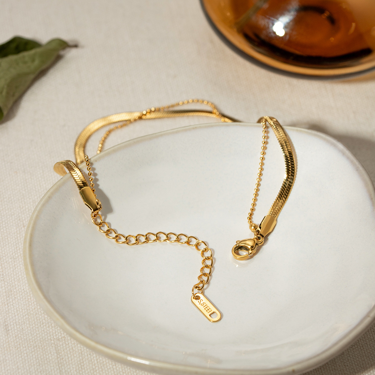 Europa y los Estados Unidos transfronterizos INS viento femenino 18 quilates oro pulido cuchilla cadena cadena de serpiente cadena de perlas Xiaomi doble tobilla joyería al por mayor
