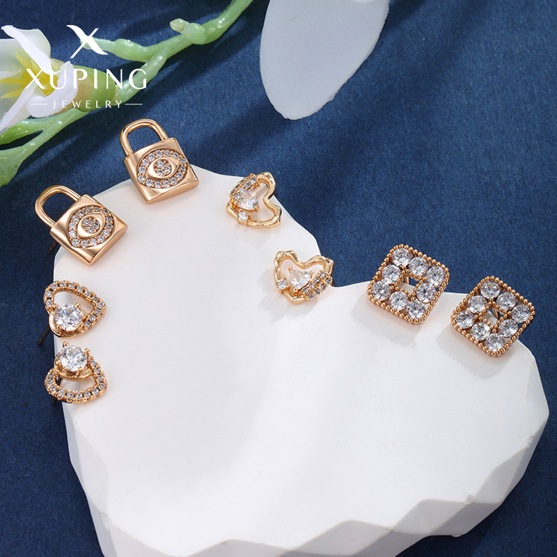 Joyería Xuping, moda japonesa y coreana, pequeña y encantadora cerradura geométrica, orejetas de amor, nicho, lujo ligero, orejetas de alta calidad para mujeres