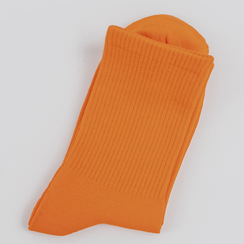 Calcetines de mujer para primavera y otoño, calcetines de algodón de color liso, versátiles y a la moda, calcetines holgados, calcetines de longitud media, calcetines deportivos que absorben el sudor, venta al por mayor.