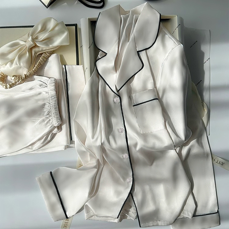 純色のシンプルな氷の女性のパジャマ春と秋の長袖の小さい大衆のプリントの家庭服の2つのセットは実際に卸売りをたたきます。|undefined