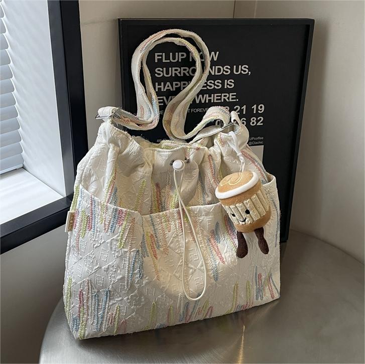 Alto sentido de la bolsa de lona de transporte casual versátil2024 nuevo bolso de mujer de verano popular gran capacidad bolso de cubo