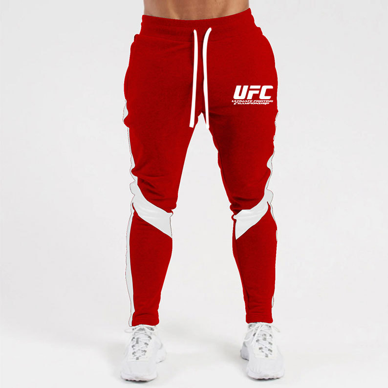 Otoño e invierno letras deportivas juventud ordinaria media elástica Mediados de cintura pantalones de algodón negro en stock moda de lana pantalones de los hombres