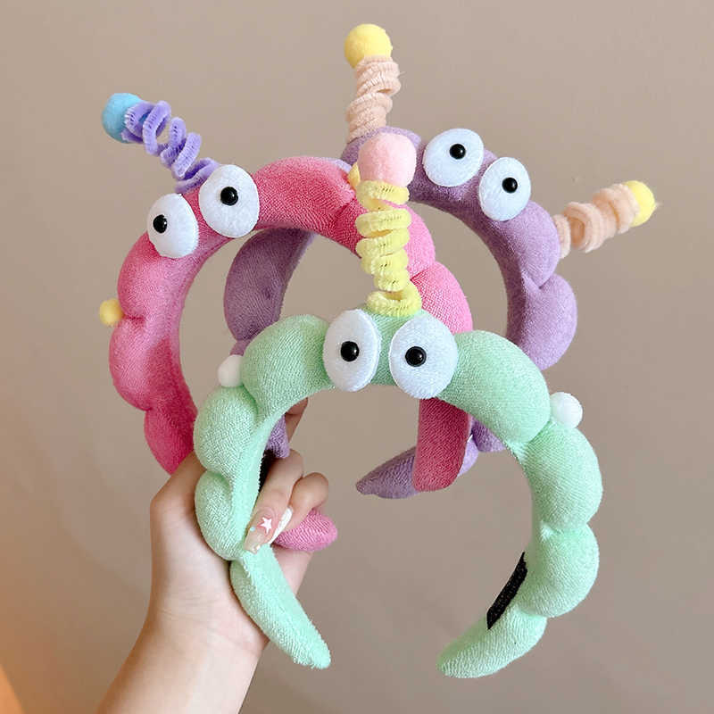 Bonito y divertido barra de torsión, banda de cabello para niños con ojos grandes, tocado de cabello para mujeres, clip de cabello para el cabello de alta cabeza antideslizante para lavar la cara.