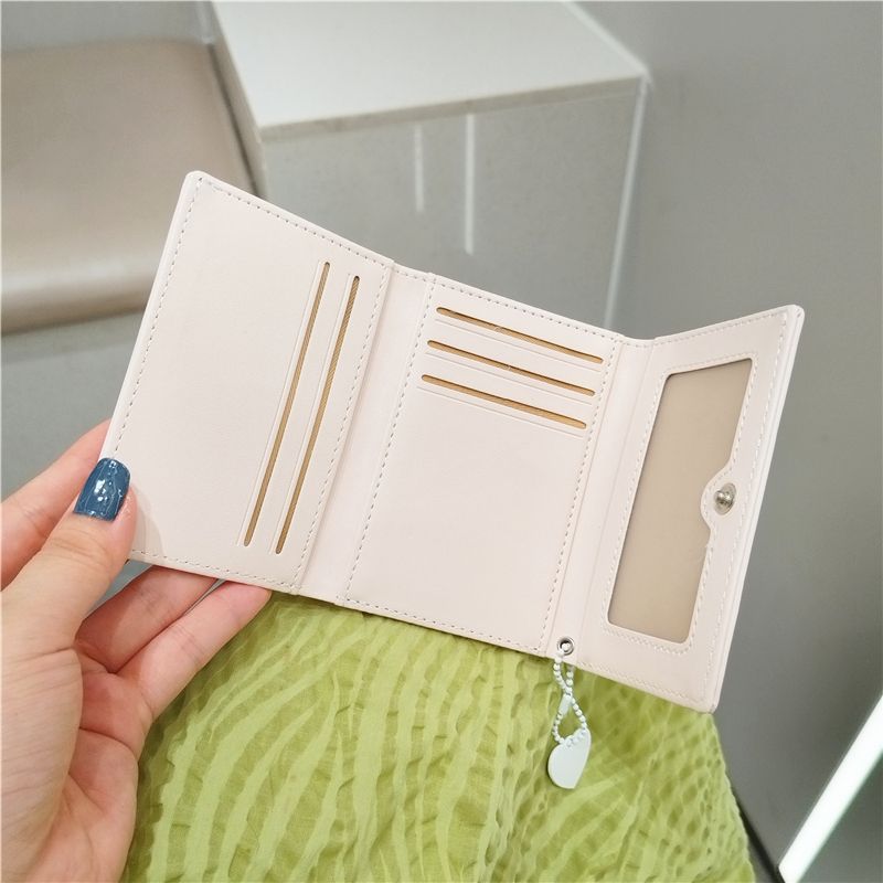 Amor corto bolso de cambio de mujer versión coreana lindo pequeño fresco plegable mini nicho bolso de tarjetas de estudiantes marea color sólido