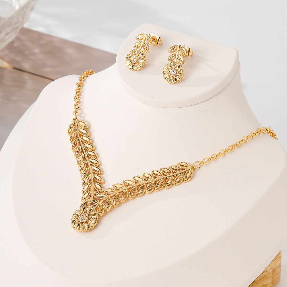 Europa y los EE.UU. collar de auriculares de bronce para mujeres joyas de piedra de zinc de moda de dos piezas de joyas elegibles transfronterizas
