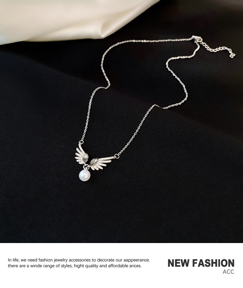 Korean Dongda Fashion Personality Pearl Necklace Design Temperament Wings Pendant Cold Style Zircon Clavicle Chain display picture 5