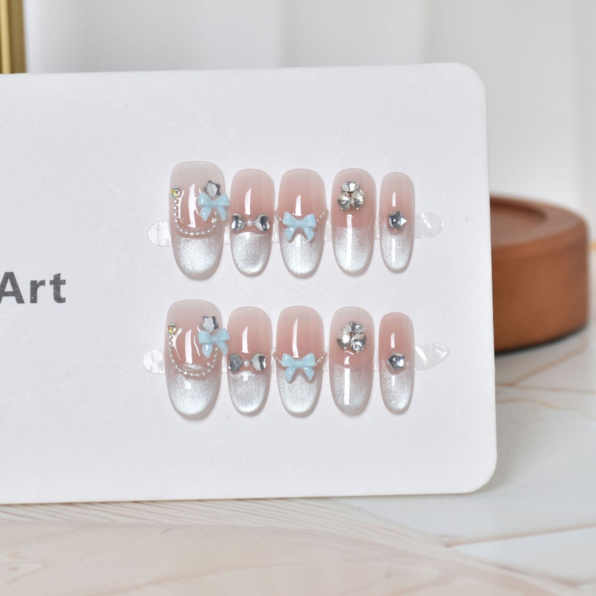 Puro uso manual de uñas elípticas azul pálido francés ojo de gato manicure parche de manicure de alta calidad