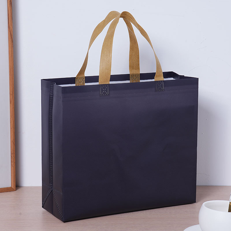 Bolsas de tela no tejida recubiertas de película personalizadas exposición bolsas de tela no tejida recubiertas de película tienda de ropa bolsas de mano personalizadas bolsas tridimensionales