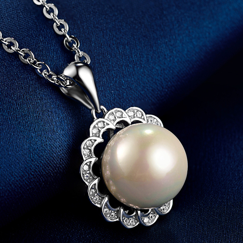 Japonés y coreano Retro Luz de lujo simple ZIRCON colgante accesorios s925 plata esterlina flor perla clavícula cadena Collar para las mujeres al por mayor