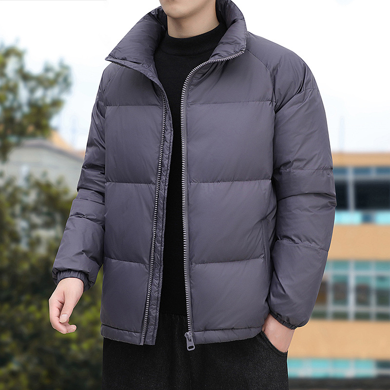Collar del soporte de los hombres de invierno abajo Chaqueta de algodón acolchado juventud color sólido luz gruesa caliente abrigo de algodón acolchado abrigo suelto pan venta al por mayor