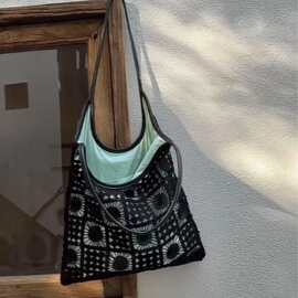 时尚女潮流个性水桶包腋下包镂空大容量休闲通勤四季松弛感单肩包