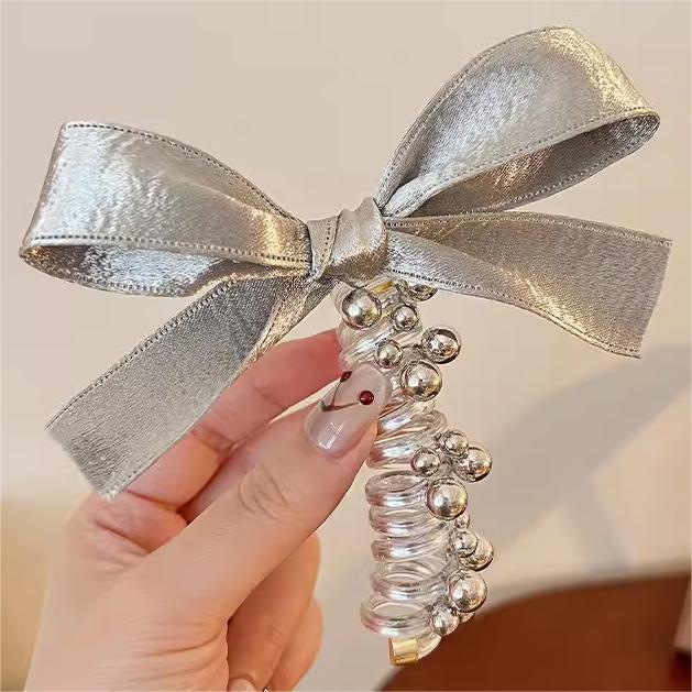 Coreana chica arco plateado línea telefónica bucle de cabello dulce burbuja lámpara de cabello cordón elástico cordón de cabello mujer