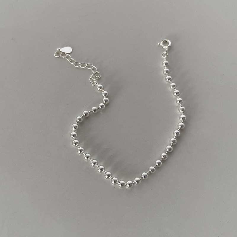 Pulsera de lujo ligera de estilo japonés ins diseño de nicho en línea rojo todo partido femenino verano plateado simple novias pulsera de estudiante moda