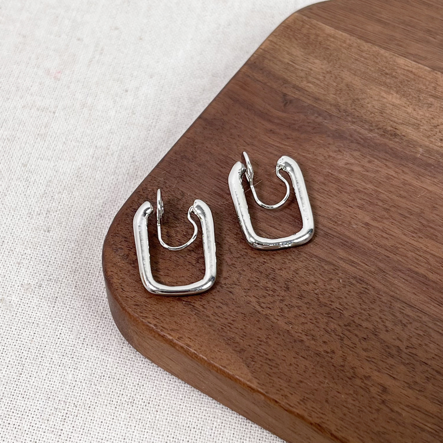 Square ear clips, 32