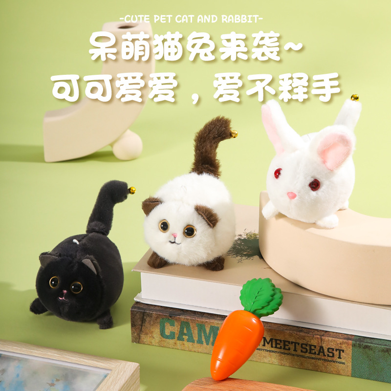 El cable de tracción girará la cola gatito niños llavero campana pequeña colgante puppet muñeca de peluche al por mayor