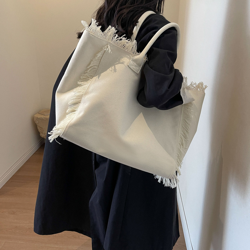 Women's Bag Niche Design Korean Style Tassel Canvas Beach Bag Women's Large Capacity Simple Commuting European and American Cross-Border Hot Style Single