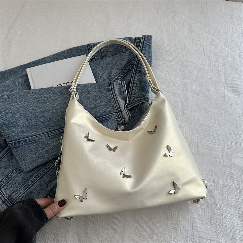 Bolso de cadena de moda popular para mujeres 2024 verano nuevo bolso de hombro de gran capacidad nicho mariposa mochila de trabajo