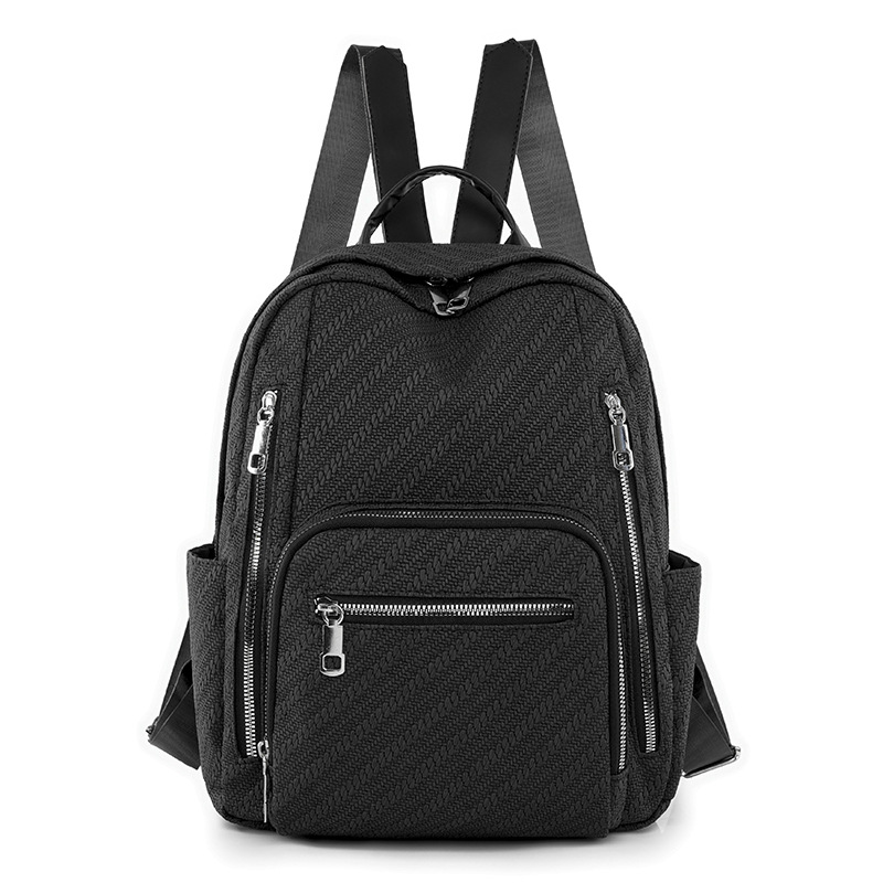 Ventas directas de fábrica 2024 primavera nueva mochila simple de color sólido para mujer mochila de viaje de gran capacidad para viajeros urbanos