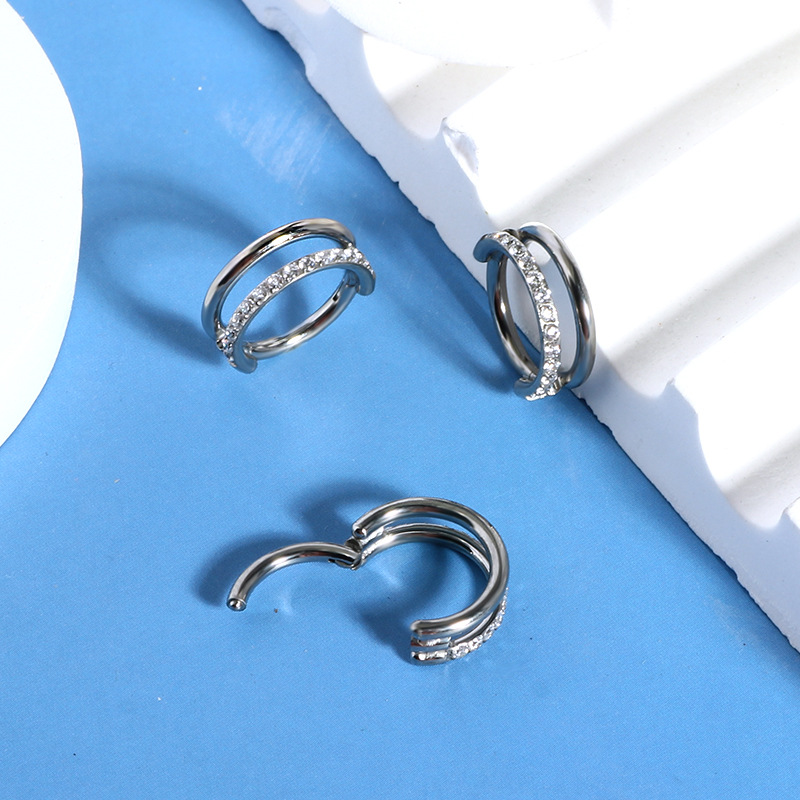 Silver pointed spike labret stud material detail