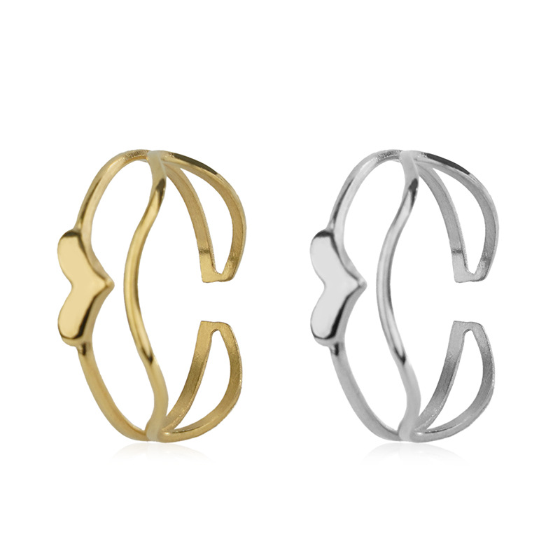 Minimalistic wavy design golden glossy ring heart-shaped stainless…