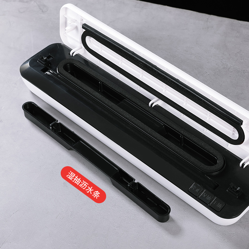 A new small household high suction vacuum sealing machine for food preservation, suitable for dry, wet, powder, and oil using a plastic sealing machine.