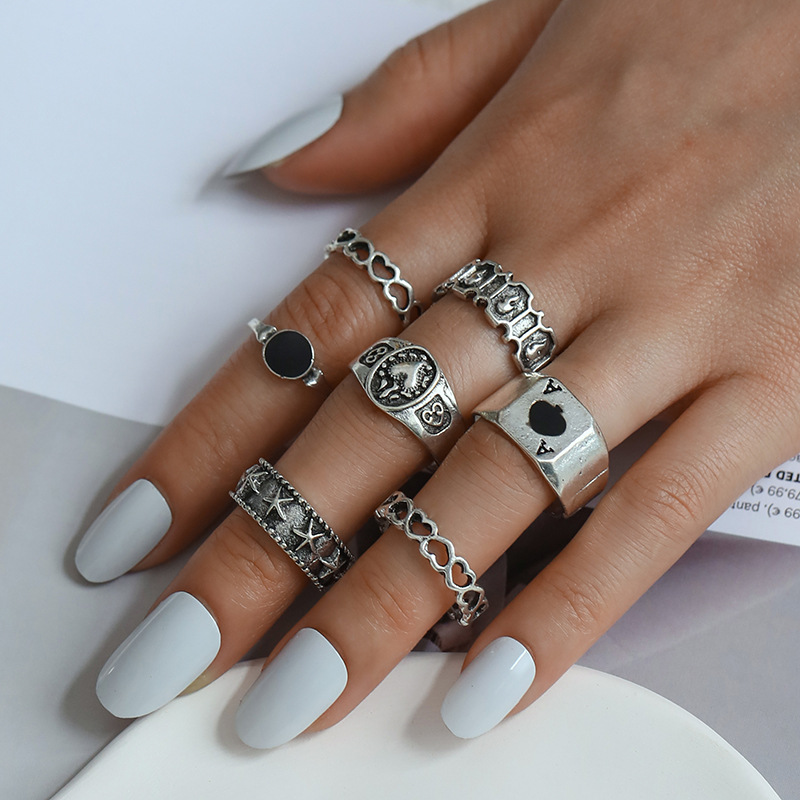 hot selling jewelry Fashion hollow love simple atmosphere dark retro spade love ring 7 piece set_senzul.com