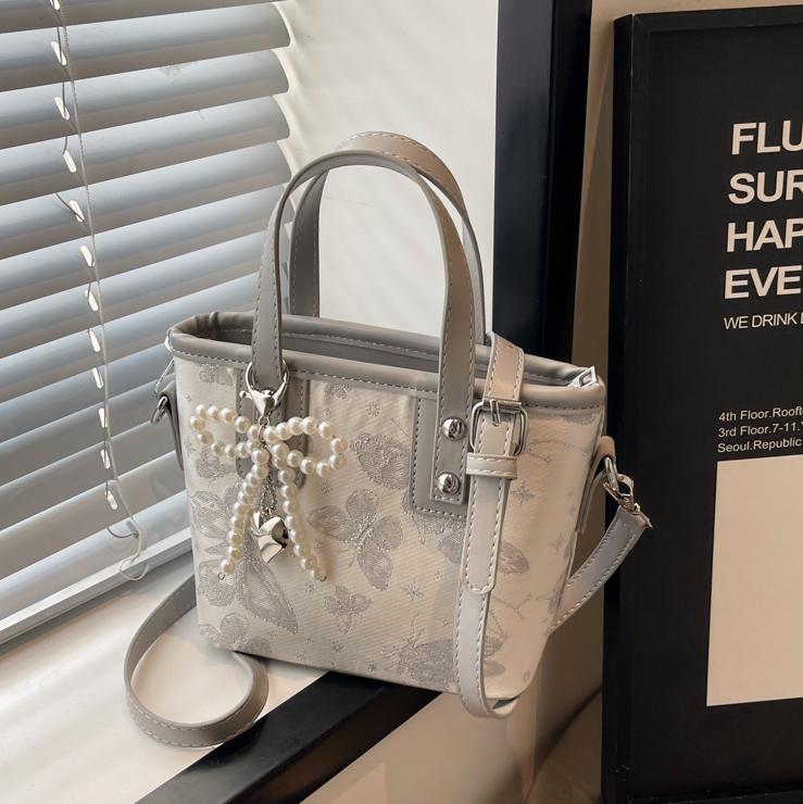 Bolsa de cubo de mano para mujeres 2025 nuevo estilo nacional popular bolso de hombro alta textura versátil bolso de moda moda