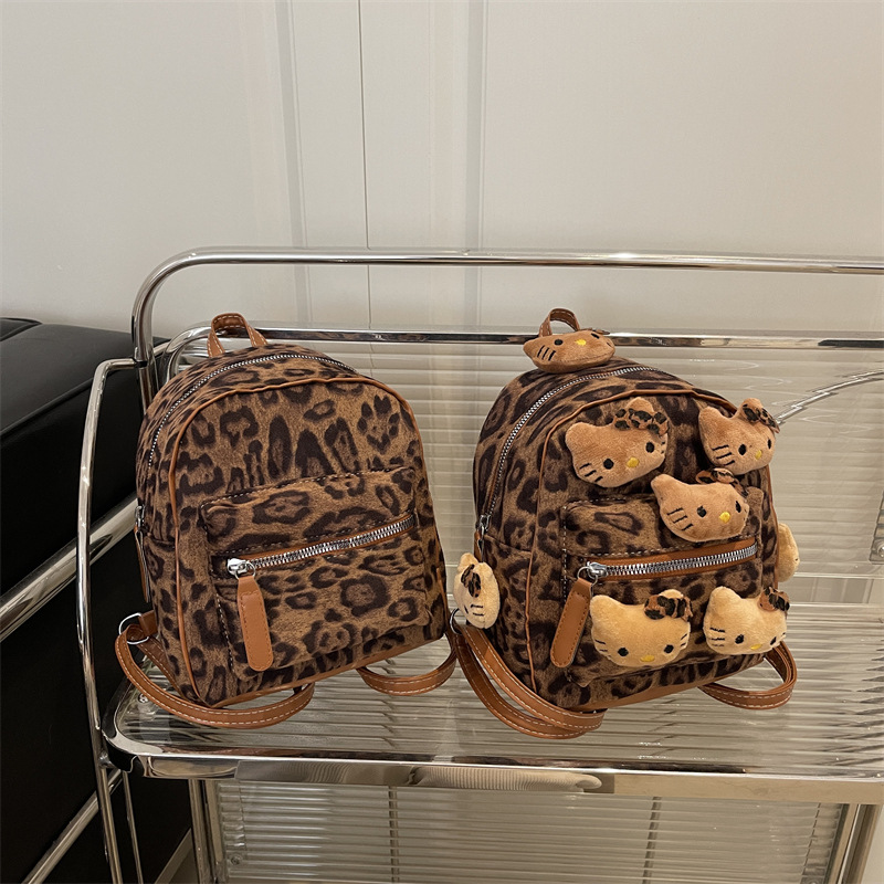 Mochila retro leopardo para mujeres 2025 nueva moda versátil mochila de estudiantes otoño sensación de alto nivel bolso de mano ocio