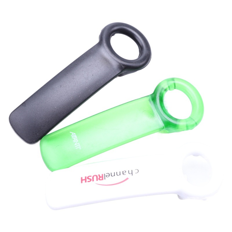 Ventas directas de la fábrica una variedad colores 5*14cm superficie imprimible plástico sólido abrelatas creativo tapa dispositivo torsión