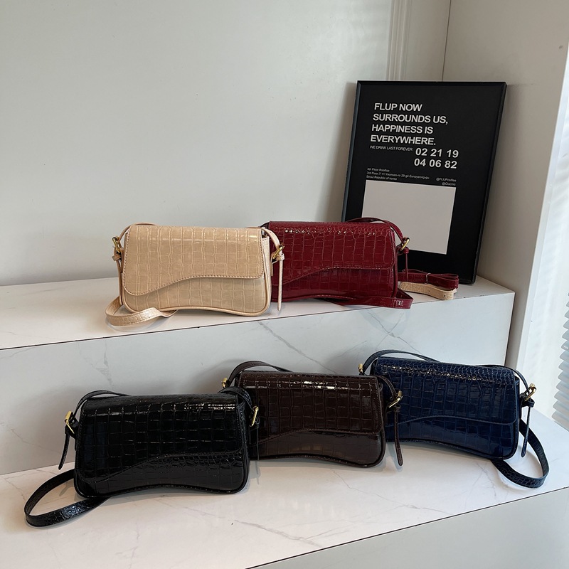 2024 nuevo estilo PU de color sólido moda personalidad diaria patrón de piedra simple bolso de hombro bolso de axila con hebilla de metal