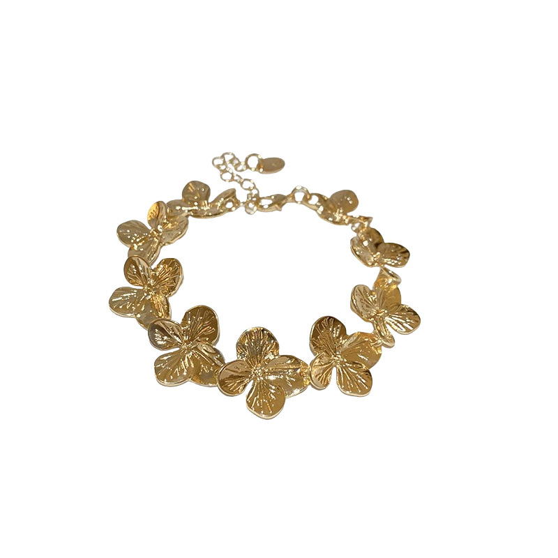 Nuevo estilo transfronterizo de costura flor aretes pulsera collar conjunto de lujo ligero viento frío cadena de clavícula moda joyería de todo fósforo