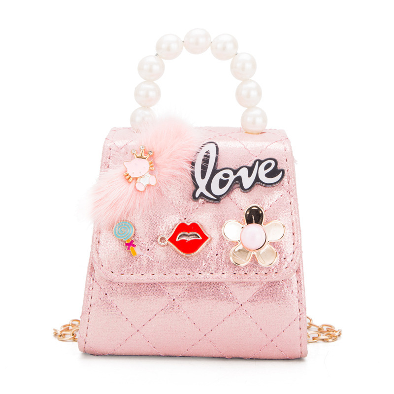 2025 primavera y verano estilo caliente moda casual niños dulces bolsa de gelatina mini bolso de mensajero de un solo hombro variedad al por mayor