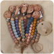 New baby products beech wood pacifier clip to appease baby silicone beads bite molar tooth glue toy anti-drop chain