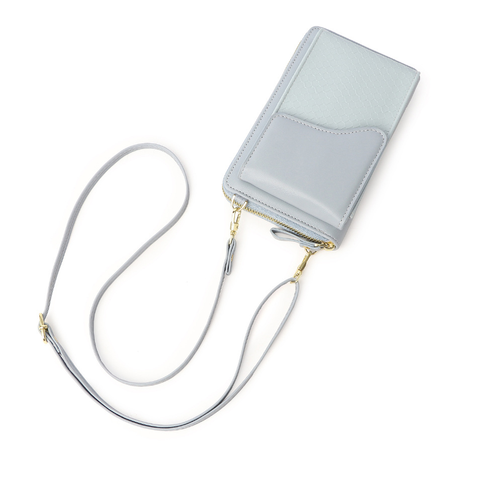 Bolsa de nicho de gama alta para mujeres 2023 nueva cartera de moda patrón de serpiente hombro bolsa de mensajero todo a juego ins bolsa de teléfono