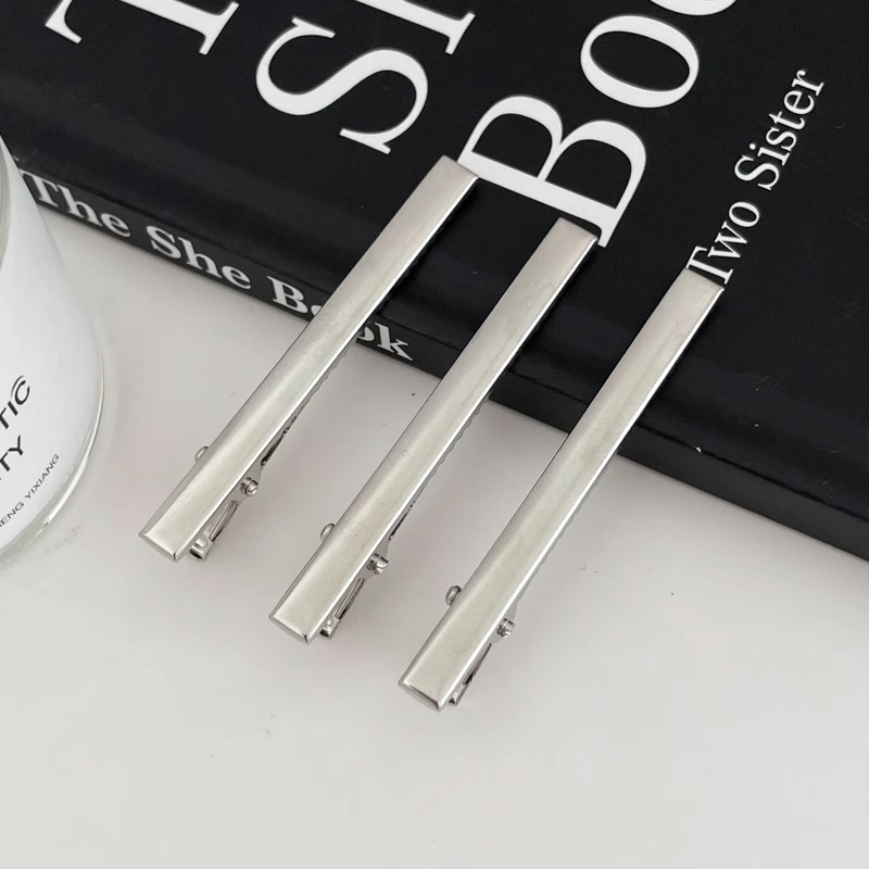 Fijación de cabello de metal fría plata en forma de clip de nariz de pato temperamento agujero estrellas clip de cabello frente lateral clip de cabello roto mujer