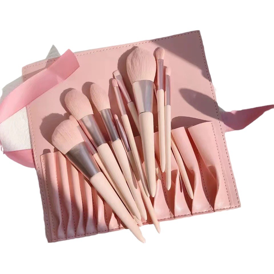 Nuevo 11 concubina sonrisa cepillo de maquillaje traje de piel suave rosa polvo suelto cepillo conjunto completo de herramientas de belleza para la entrega transfronteriza