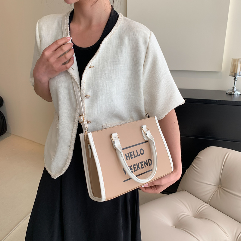 Popular bolso de mujer de estilo extranjero 2024 nueva moda impresión de letras bolso de mochila texturas casuales bolso de moda