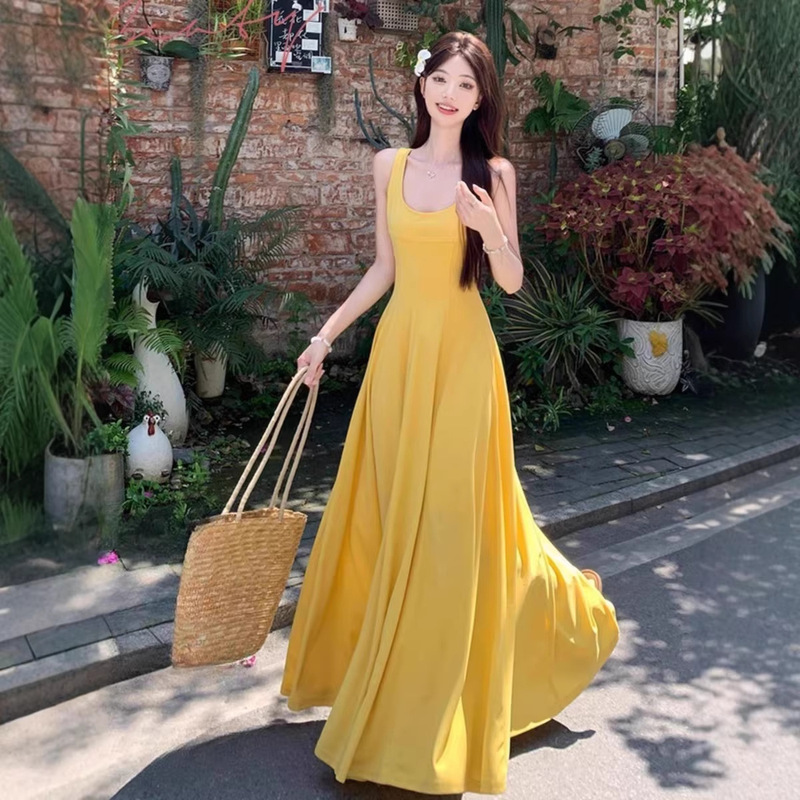 Beach Resort Style Yellow Suspender Dress New French Style Waist-Cinching Slimming Large Hem Skirt Summer Long Skirt for Women Beach Resort Style Yellow Suspender Dress New French Style Waist-Cinching Slimming Large Hem Skirt Summer Long Skirt for Women