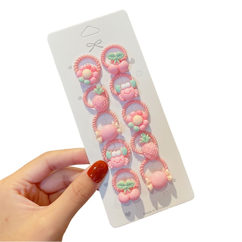 Traje de cuerda de pelo de dibujos animados para niños pequeño tamaño pulgar anillo de pelo niña bebé lindo cabeza cuerda banda de goma estilo coreano accesorios para el cabello al por mayor